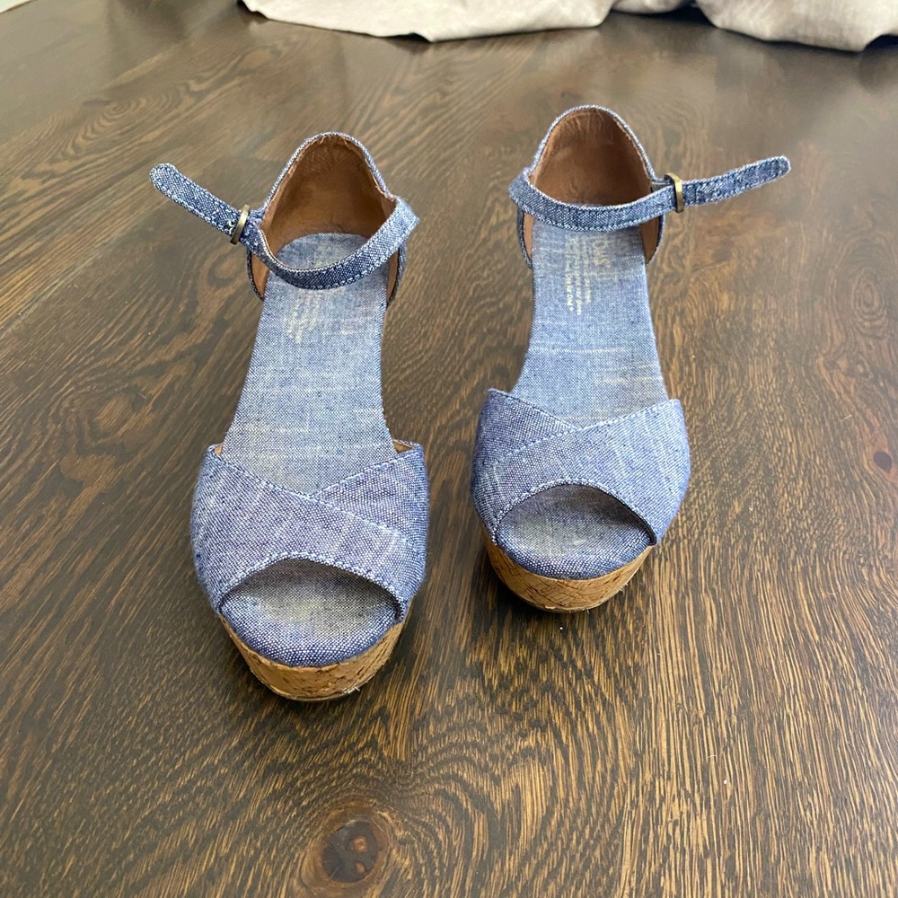 Toms peep toe denim/chambray sandals with cork bottom.
